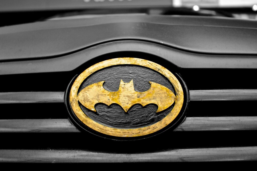 Black and Brown Batman Emblem Close-up Photography